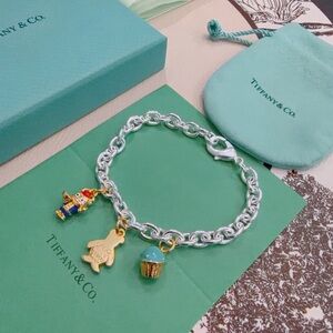 Tiffany & Co. Silver and Gold Charm Bracelet
